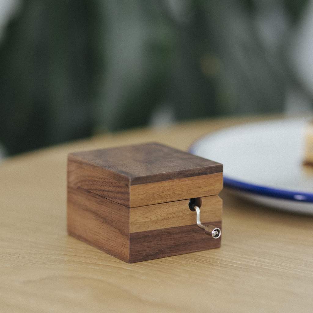 Small walnut music box
